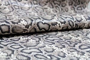 Mini Moluro printed snake on embossed goat leather crotalo style